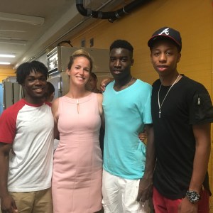 Chrystina Russell, founding principal of Global Tech with (from left) Quentin, who is going to Monroe College in New Rochelle; Travis, who is going to New York City Tech/CUNY; and Dariel who has been studying to be an auto mechanic and will attend Duchess Community College